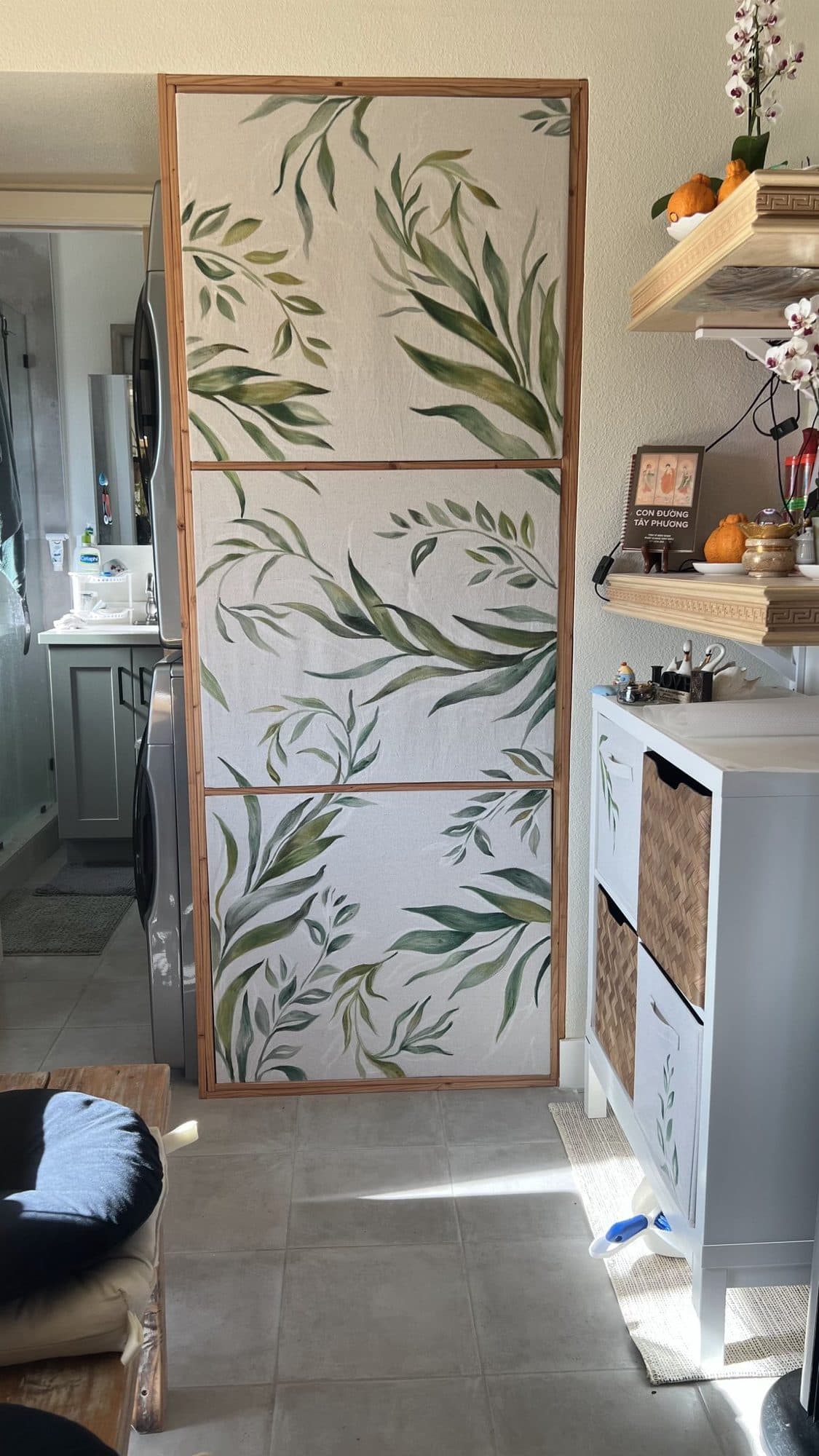 Eucalyptus leaves painted on a tall home divider panel